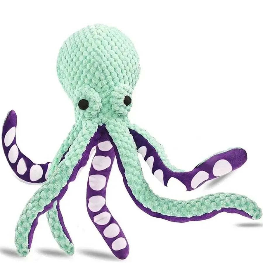 Plush Octopus Dog Toy in mint green textured fleece with black eyes and purple tentacles patterned with white spots